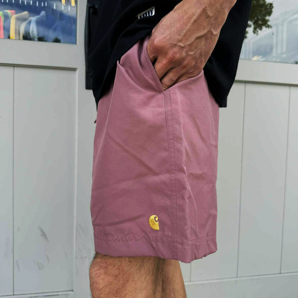 Carhartt WIP - CHASE SWIM TRUNKS - DUSTY PINK/GOLD