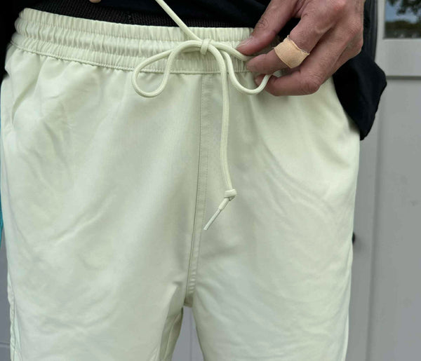 Carhartt WIP - CHASE SWIM TRUNKS - AIR GREEN/GOLD