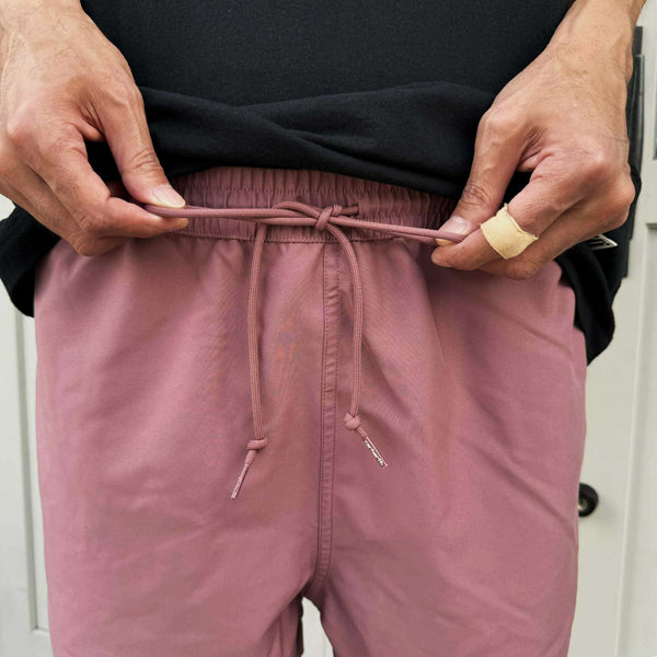 Carhartt WIP - CHASE SWIM TRUNKS - DUSTY PINK/GOLD