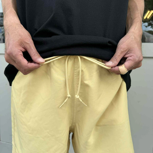 Carhartt WIP - CHASE SWIM TRUNKS - AIR YELLOW/GOLD