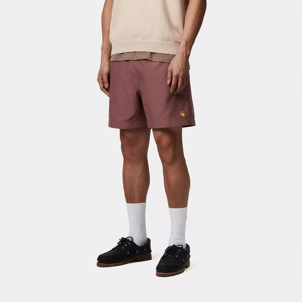 Carhartt WIP - CHASE SWIM TRUNKS - DUSTY PINK/GOLD