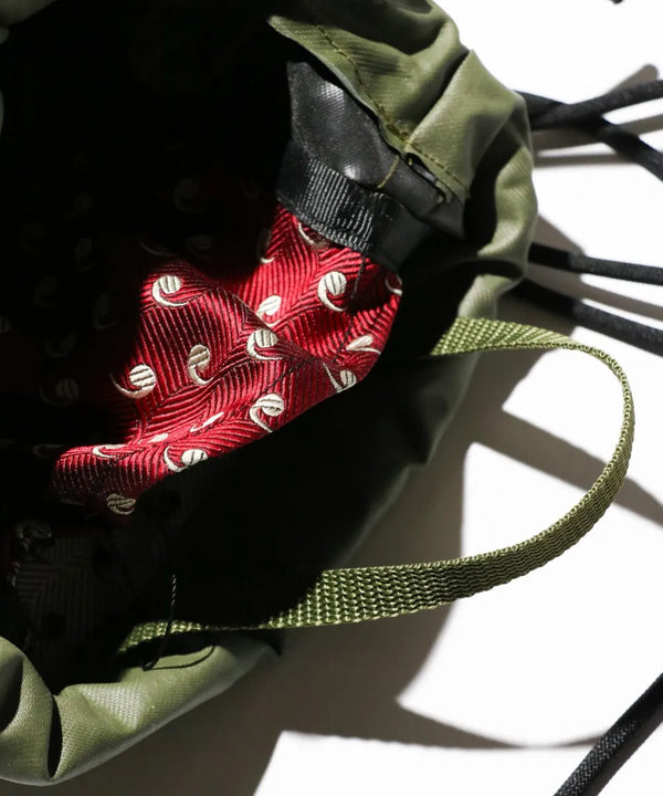 THRIFTY LOOK - RUBBER EFFECT BAG - S- OLIVE